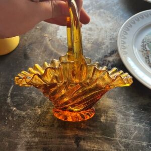 vintage amber glass basket produced by Fenton Art Glass